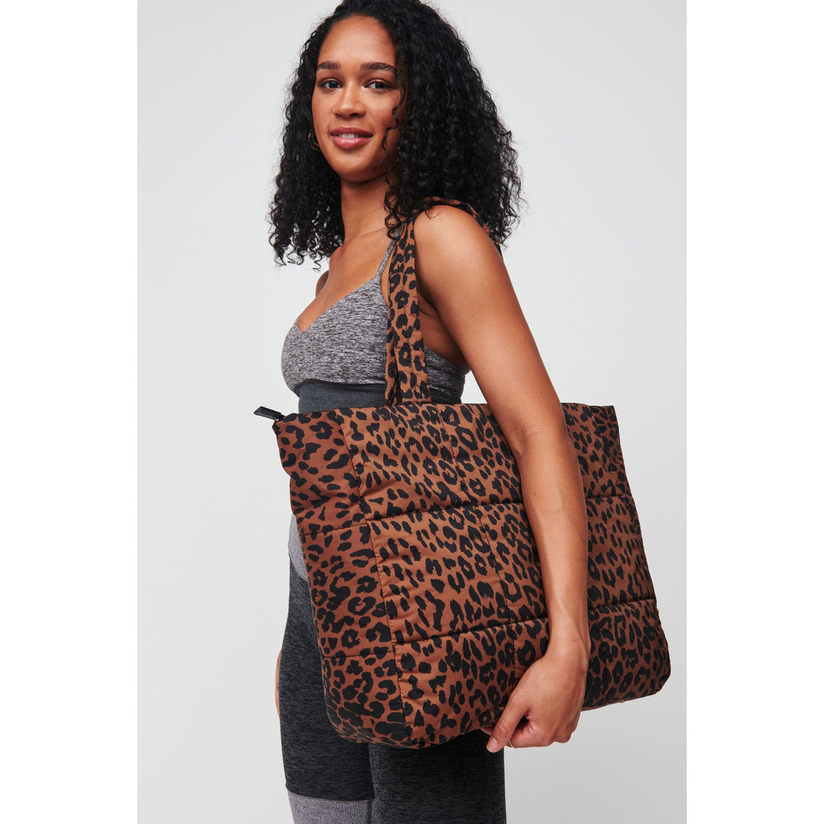 Woman wearing Leopard Urban Expressions Neeva Tote 818209010429 View 2 | Leopard