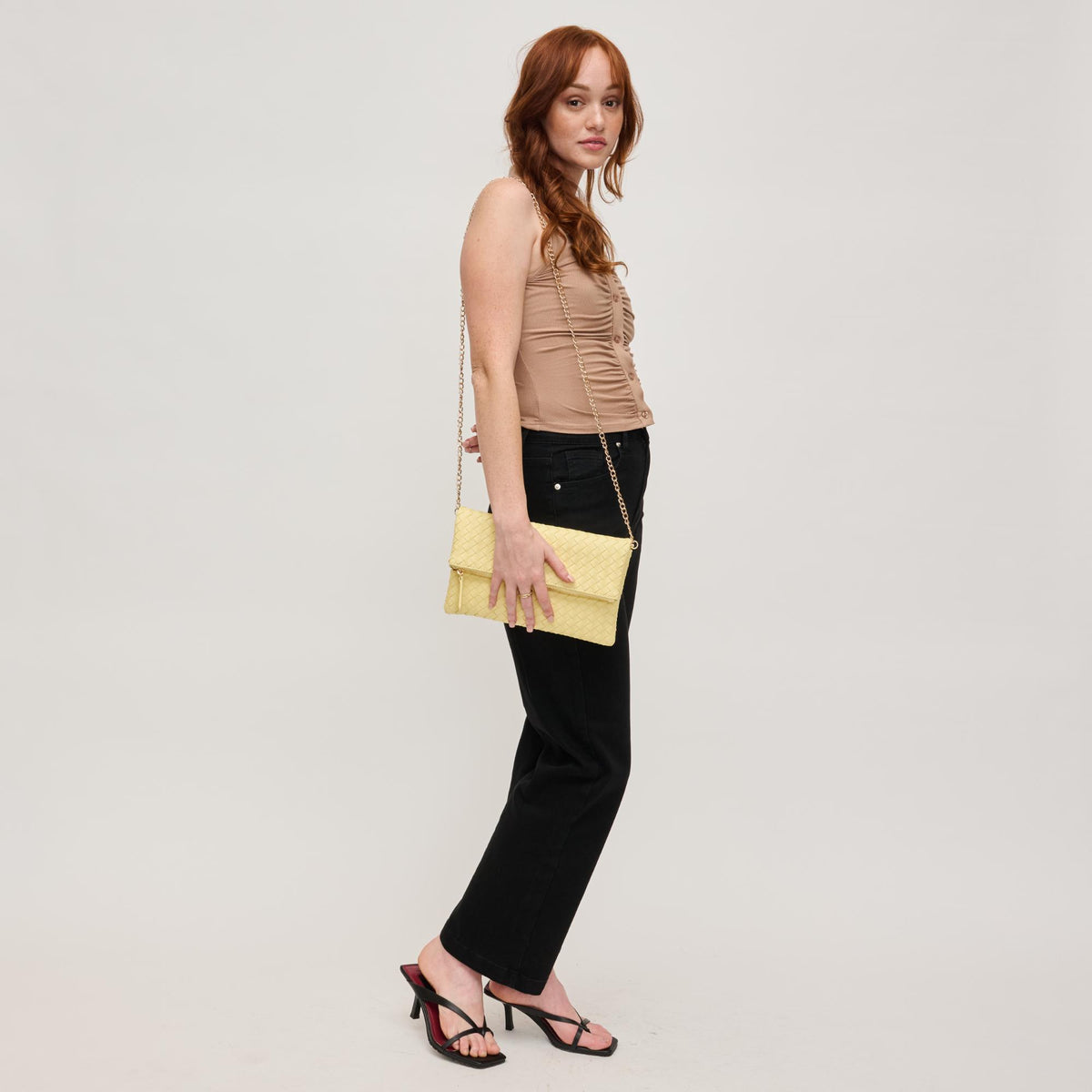 Woman wearing Butter Urban Expressions Grace Clutch 840611145024 View 3 | Butter