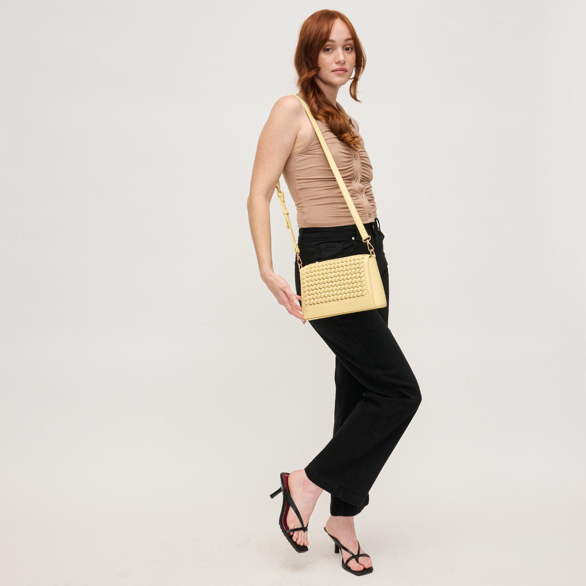 Woman wearing Butter Urban Expressions Nina Crossbody 840611144546 View 3 | Butter