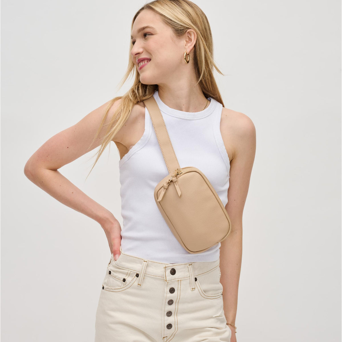 Woman wearing Natural Urban Expressions Jaxx Belt Bag 840611191717 View 1 | Natural