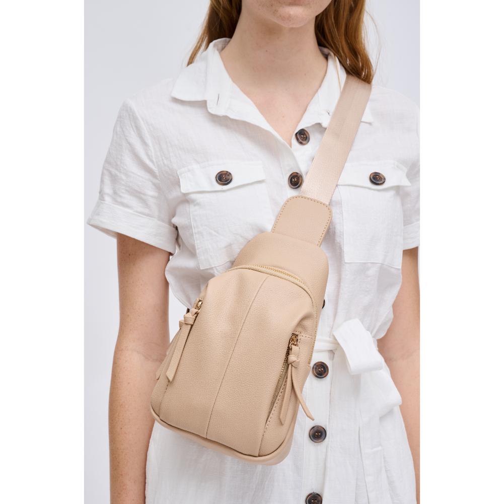 Woman wearing Natural Urban Expressions Emille Sling Backpack 840611191571 View 1 | Natural