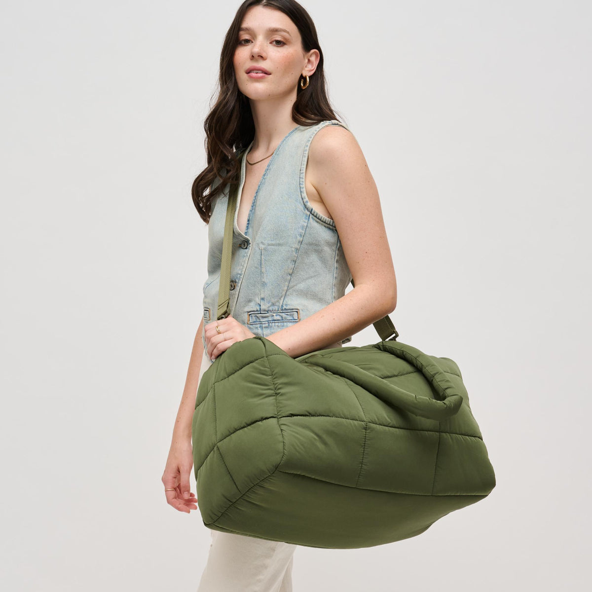 Woman wearing Olive Urban Expressions Freyja Duffel 840611124289 View 3 | Olive