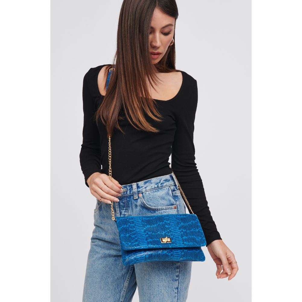 Woman wearing Blue Urban Expressions Rykard - Snake Clutch 818209016209 View 2 | Blue