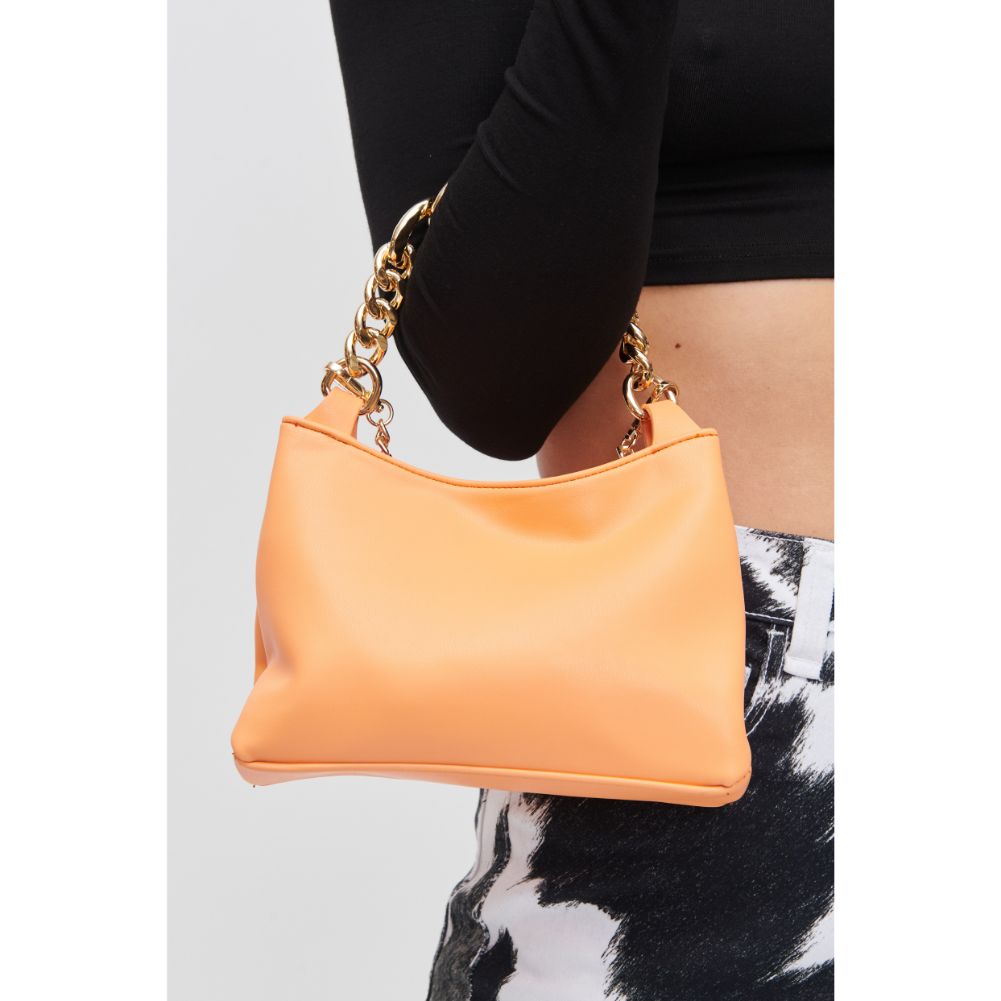 Woman wearing Tangerine Urban Expressions Yume Crossbody 840611108210 View 4 | Tangerine