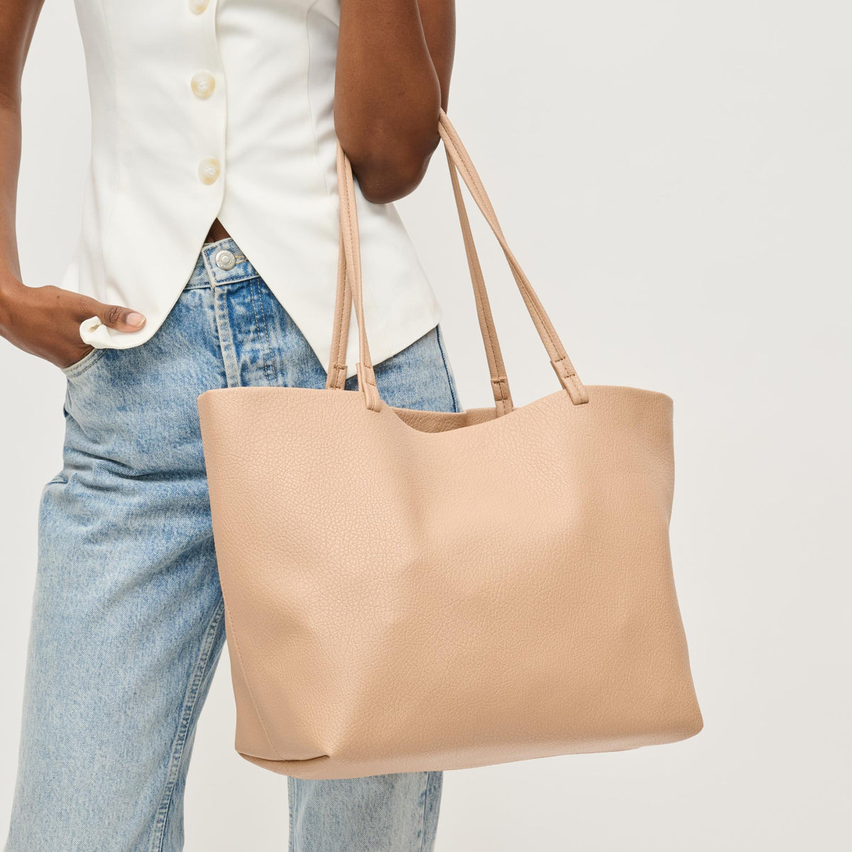 Woman wearing Natural Urban Expressions Alma Tote 840611146823 View 1 | Natural