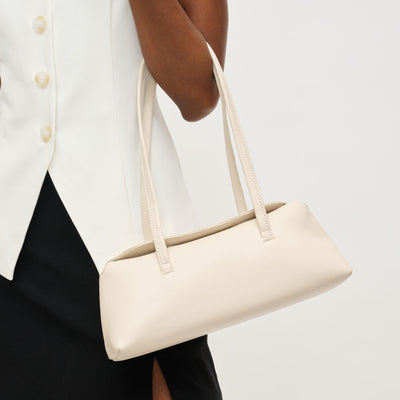 Woman wearing Oatmilk Urban Expressions Merlinda Shoulder Bag 840611157089 View 1 | Oatmilk