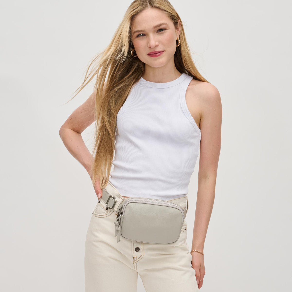 Woman wearing Dove Grey Urban Expressions Jaxx Belt Bag 840611191724 View 1 | Dove Grey