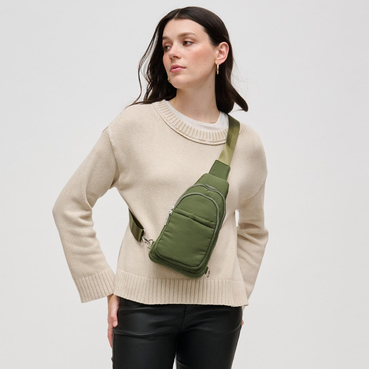 Woman wearing Olive Urban Expressions Kenny Sling Backpack 840611124968 View 1 | Olive