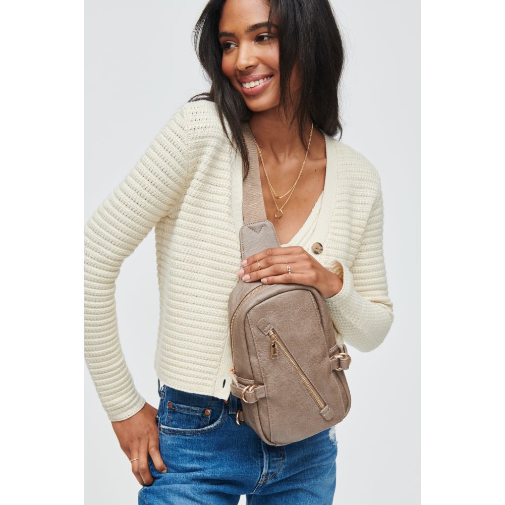 Woman wearing Taupe Urban Expressions Micah Sling Backpack 840611108791 View 1 | Taupe