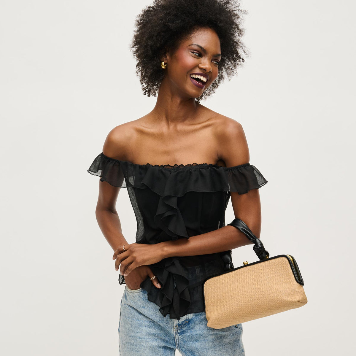 Woman wearing Natural Black Urban Expressions Julissa Clutch 840611158611 View 2 | Natural Black