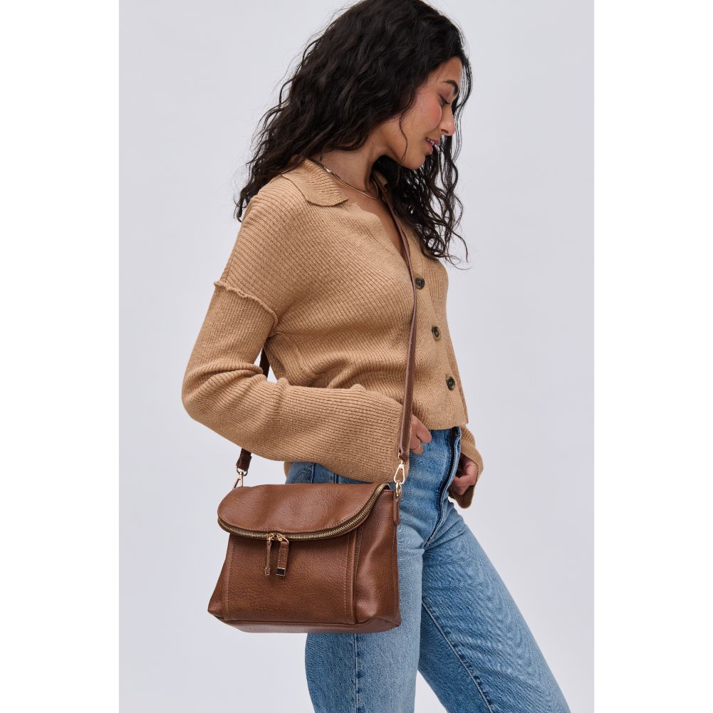 Woman wearing Chocolate Urban Expressions Iris Crossbody 840611116031 View 1 | Chocolate