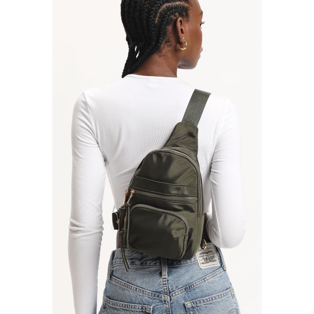 Woman wearing Olive Urban Expressions Sid Sling Backpack 840611120687 View 1 | Olive