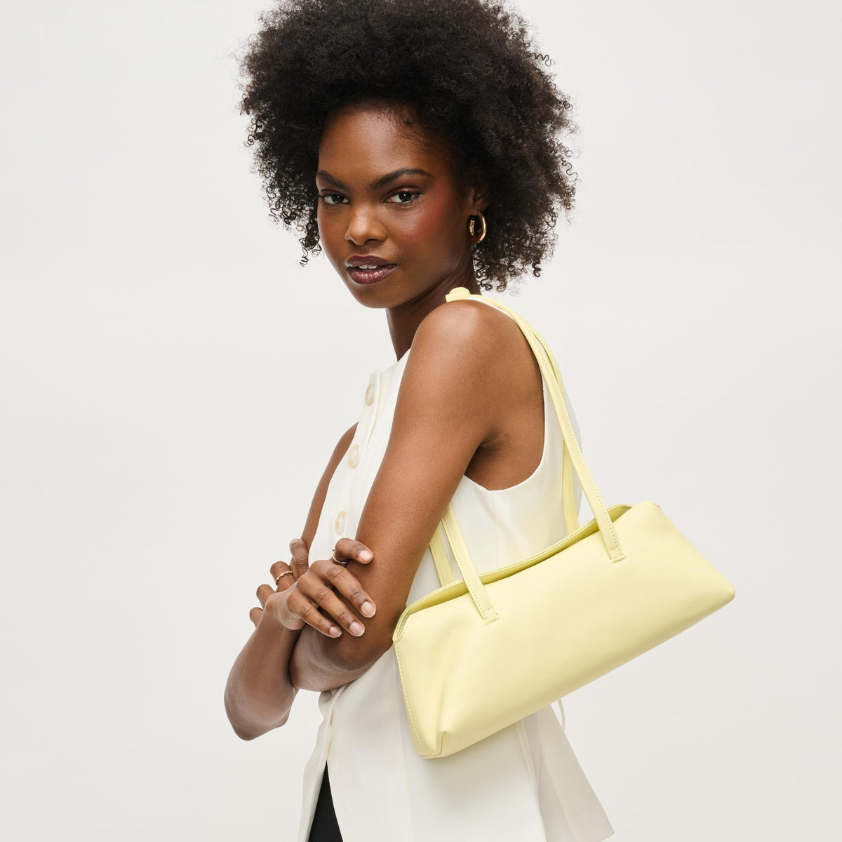 Woman wearing Butter Urban Expressions Merlinda Shoulder Bag 840611157119 View 2 | Butter