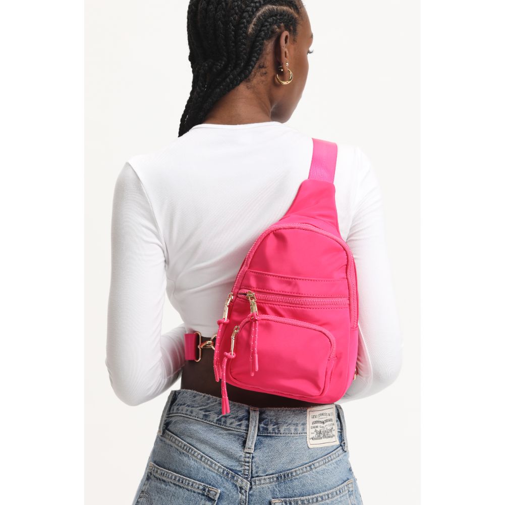 Woman wearing Rose Urban Expressions Sid Sling Backpack 840611120717 View 3 | Rose