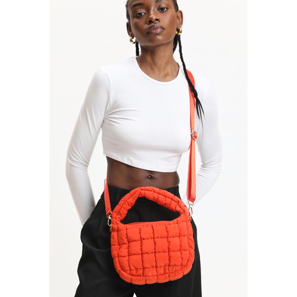 Woman wearing Tangerine Urban Expressions Leo Crossbody 840611121172 View 1 | Tangerine