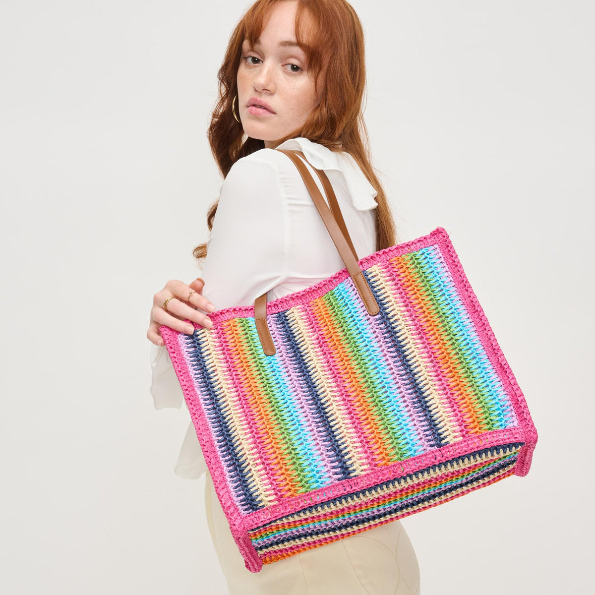 Woman wearing Pink Multi Urban Expressions Candi Tote 840611132529 View 2 | Pink Multi