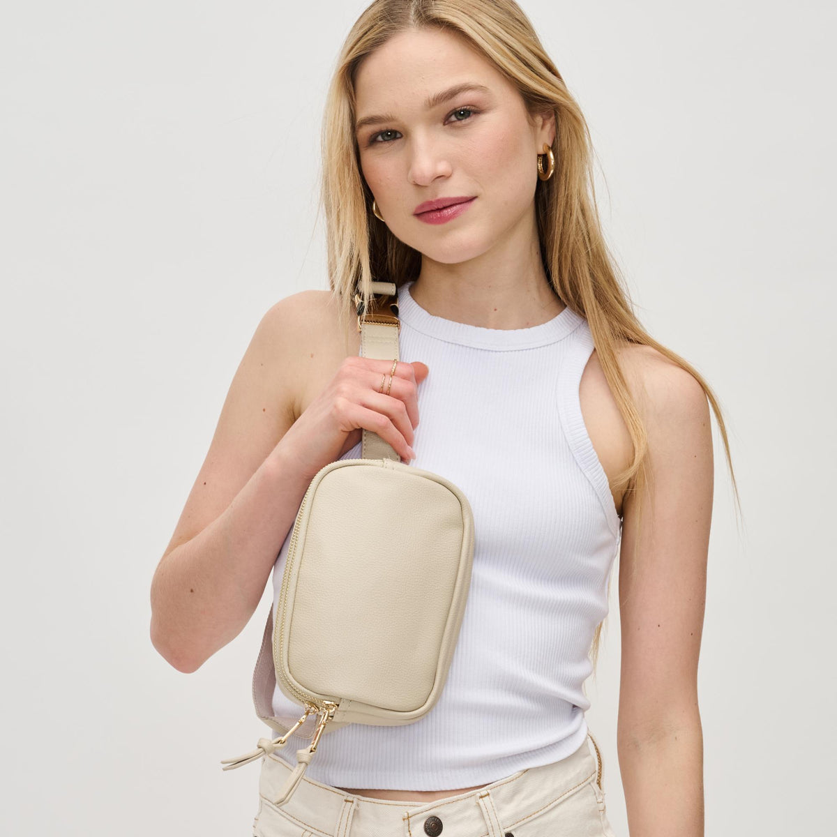 Woman wearing Ivory Urban Expressions Jaxx Belt Bag 840611191748 View 2 | Ivory