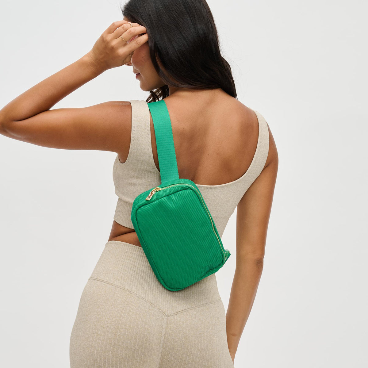 Woman wearing Green Urban Expressions Felix Belt Bag 840611122711 View 2 | Green