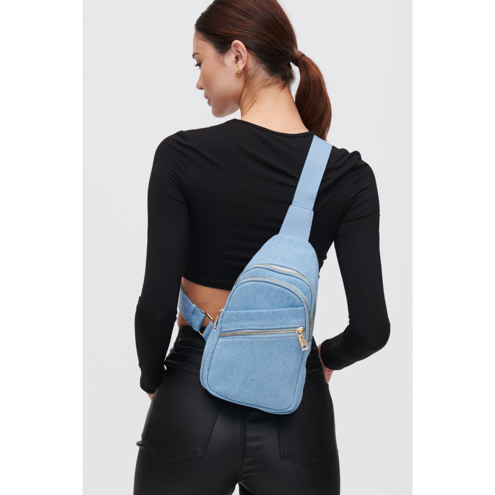 Woman wearing Denim Urban Expressions Zephyr Denim Sling Backpack 840611106872 View 1 | Denim