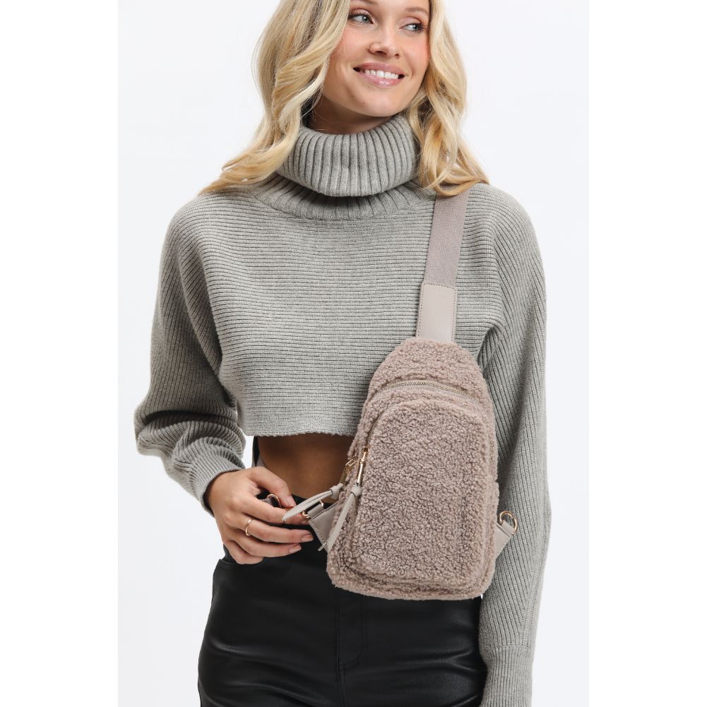 Woman wearing Nutmeg Urban Expressions Ace - Sherpa Sling Backpack 840611120533 View 1 | Nutmeg