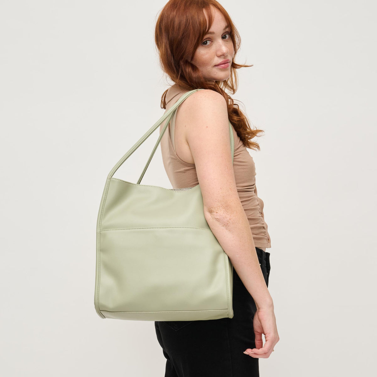 Woman wearing Sage Urban Expressions Hera Tote 840611145215 View 1 | Sage