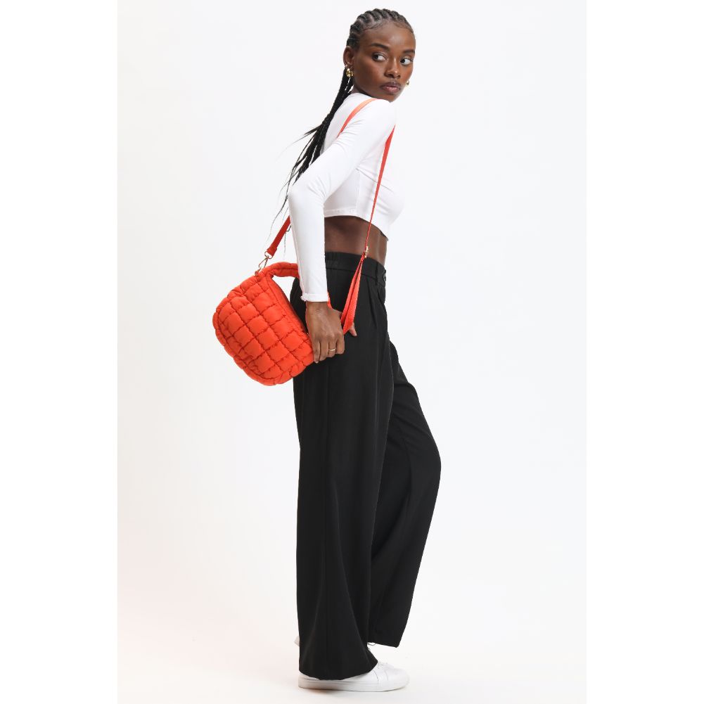 Woman wearing Tangerine Urban Expressions Leo Crossbody 840611121172 View 2 | Tangerine