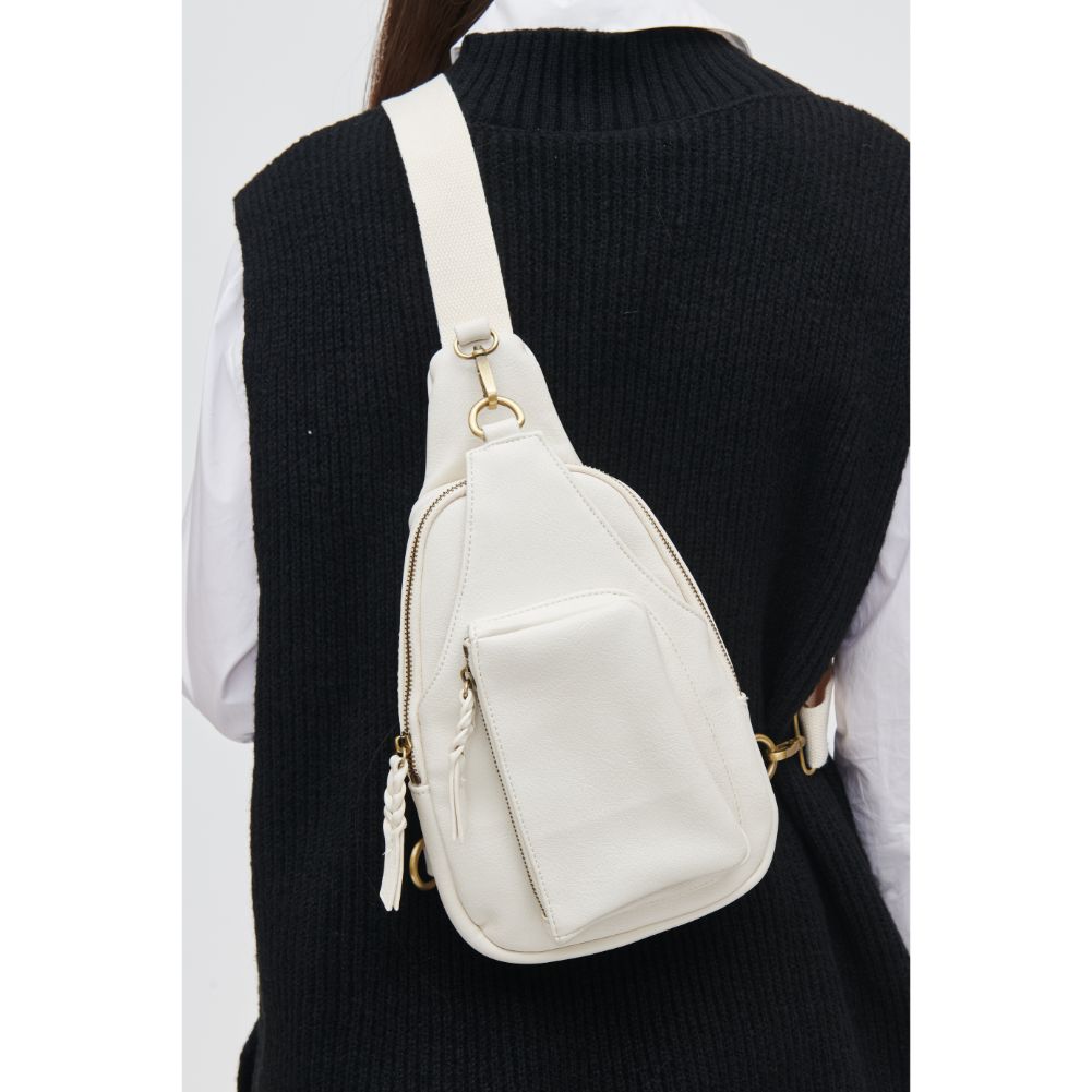 Woman wearing Ivory Urban Expressions Wendall Sling Backpack 840611107237 View 4 | Ivory