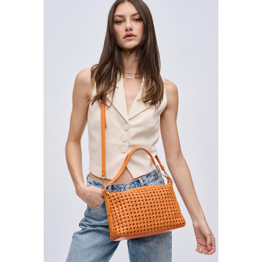 Woman wearing Tangerine Urban Expressions Dottie Crossbody 840611191939 View 1 | Tangerine