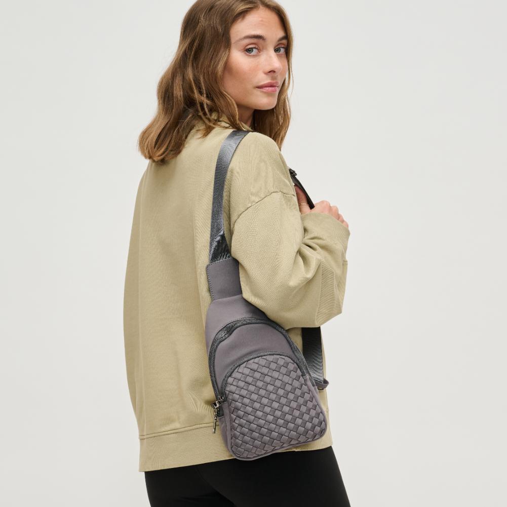 Woman wearing Grey Urban Expressions Hailey Sling Backpack 840611125491 View 2 | Grey