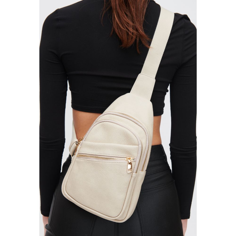 Woman wearing Almond Urban Expressions Zephyr Sling Backpack 840611106902 View 1 | Almond