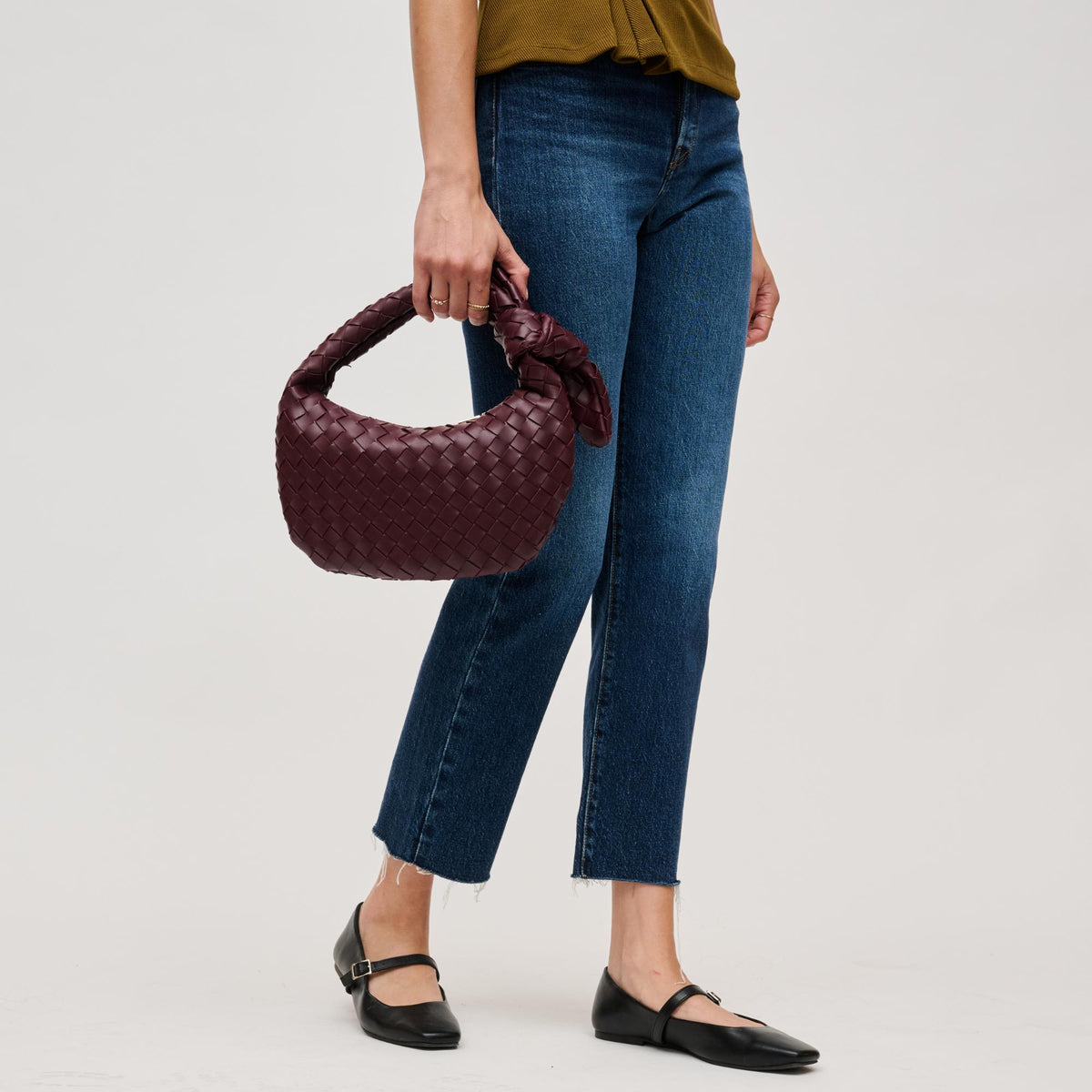 Woman wearing Merlot Urban Expressions Lizbeth Clutch 840611127822 View 3 | Merlot