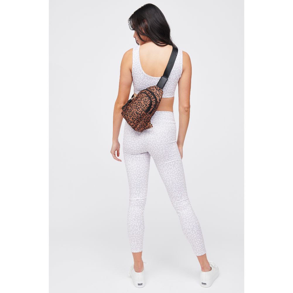 Woman wearing Leopard Urban Expressions Ace Sling Backpack 840611184191 View 4 | Leopard