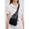 Woman wearing Black Urban Expressions Emille Sling Backpack 840611191540 View 1 | Black