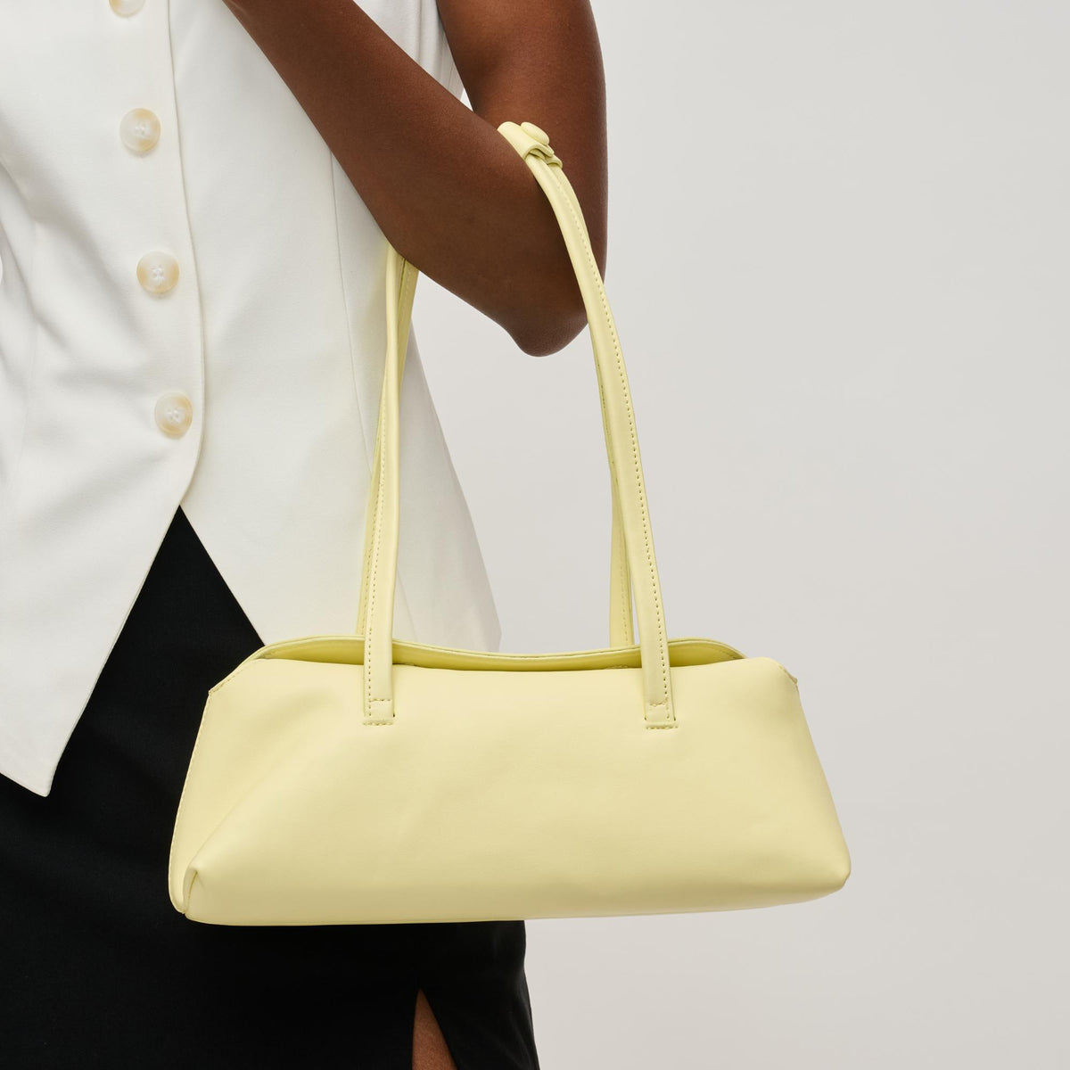 Woman wearing Butter Urban Expressions Merlinda Shoulder Bag 840611157119 View 4 | Butter