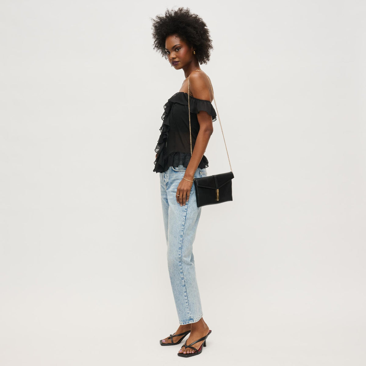 Woman wearing Black Urban Expressions Heather Clutch 840611153128 View 2 | Black