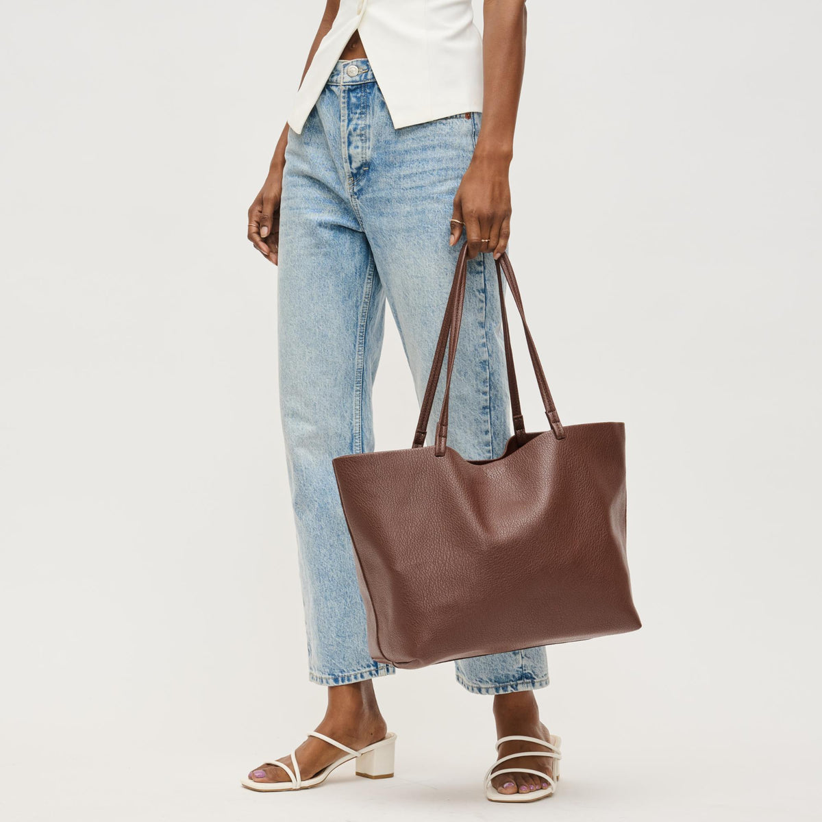 Woman wearing Chocolate Urban Expressions Alma Tote 840611146816 View 2 | Chocolate