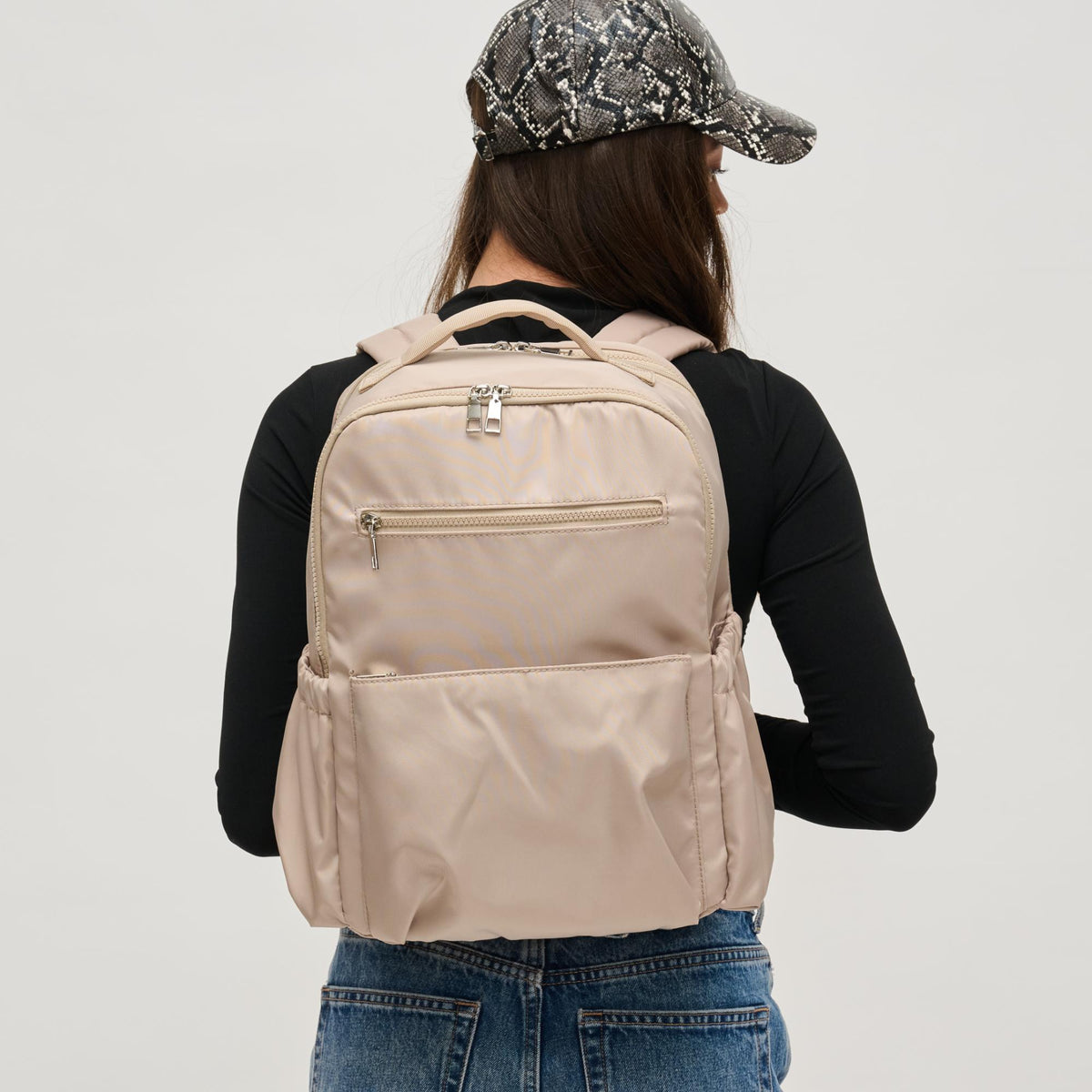 Woman wearing Nude Urban Expressions Urban Explorer Backpack 840611195364 View 1 | Nude