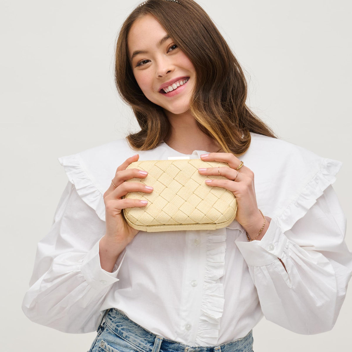 Woman wearing Ivory Urban Expressions Addie Clutch 840611158659 View 2 | Ivory