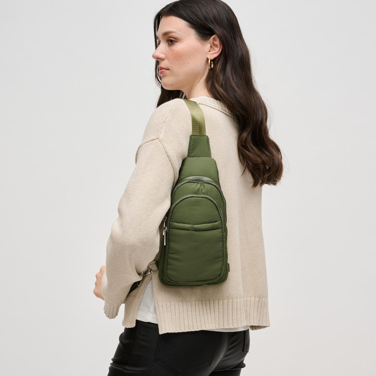 Woman wearing Olive Urban Expressions Kenny Sling Backpack 840611124968 View 3 | Olive