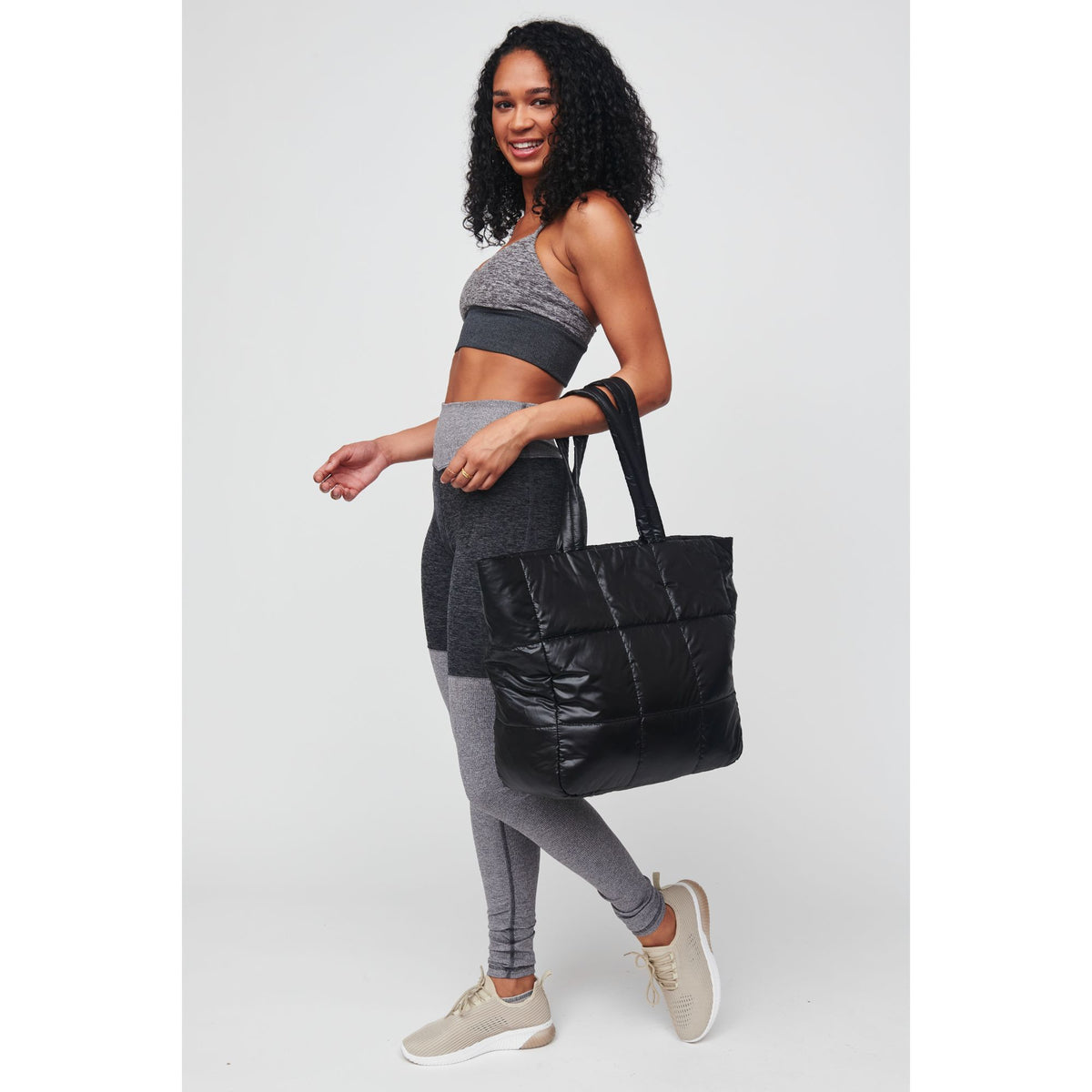 Woman wearing Black Urban Expressions Neeva Tote 818209010399 View 4 | Black