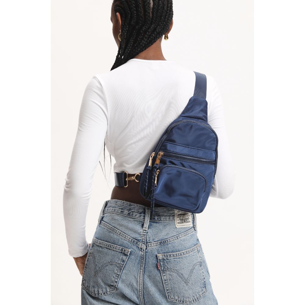 Woman wearing Navy Urban Expressions Sid Sling Backpack 840611120694 View 2 | Navy