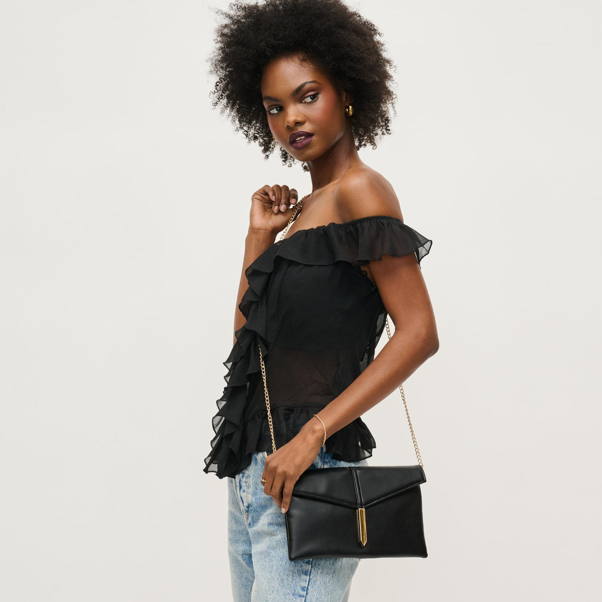 Woman wearing Black Urban Expressions Heather Clutch 840611153128 View 1 | Black