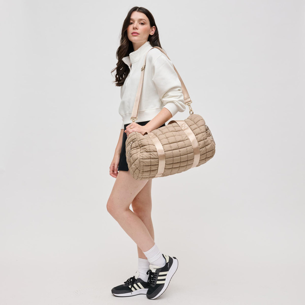 Woman wearing Natural Urban Expressions Ty Duffel 840611141217 View 4 | Natural