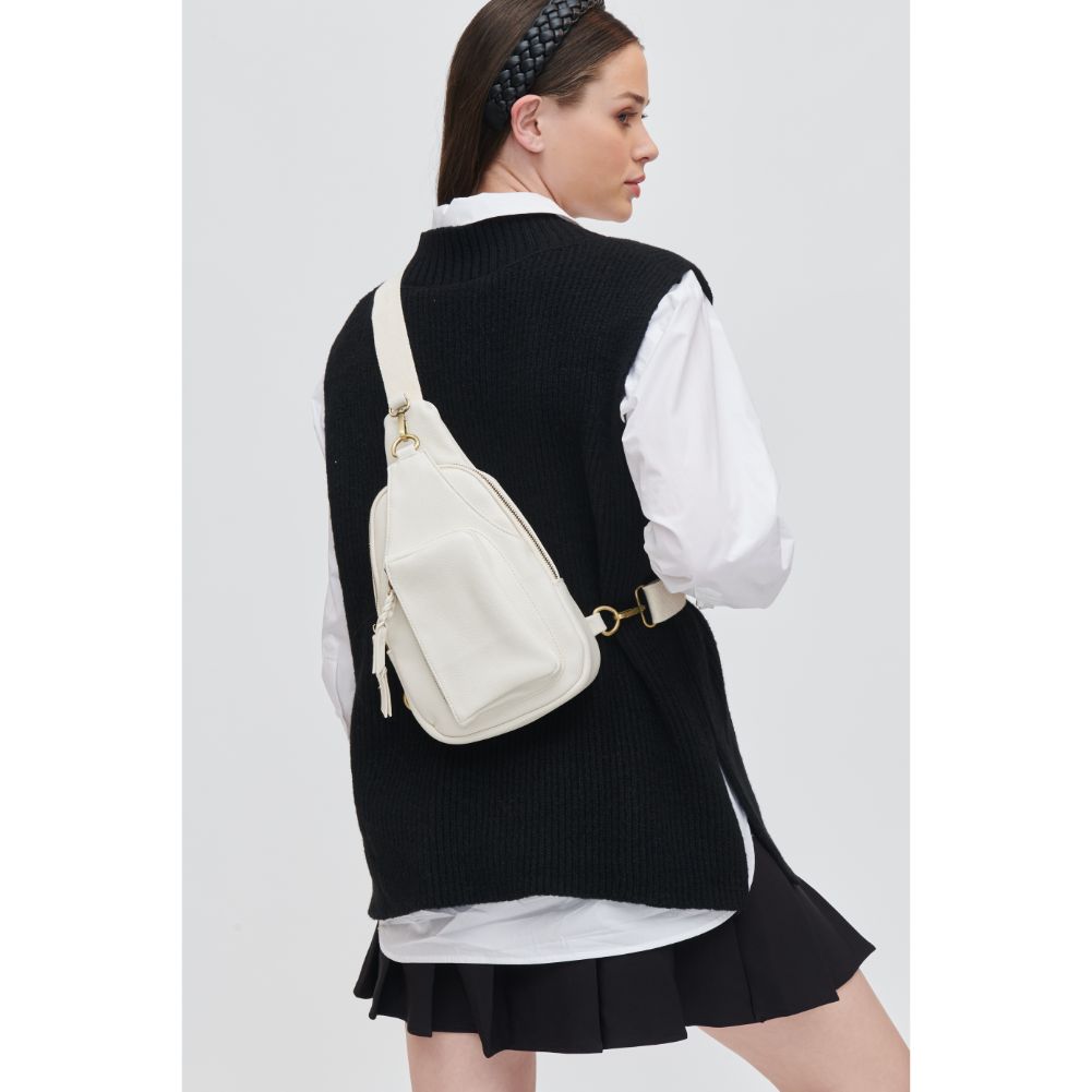 Woman wearing Ivory Urban Expressions Wendall Sling Backpack 840611107237 View 1 | Ivory