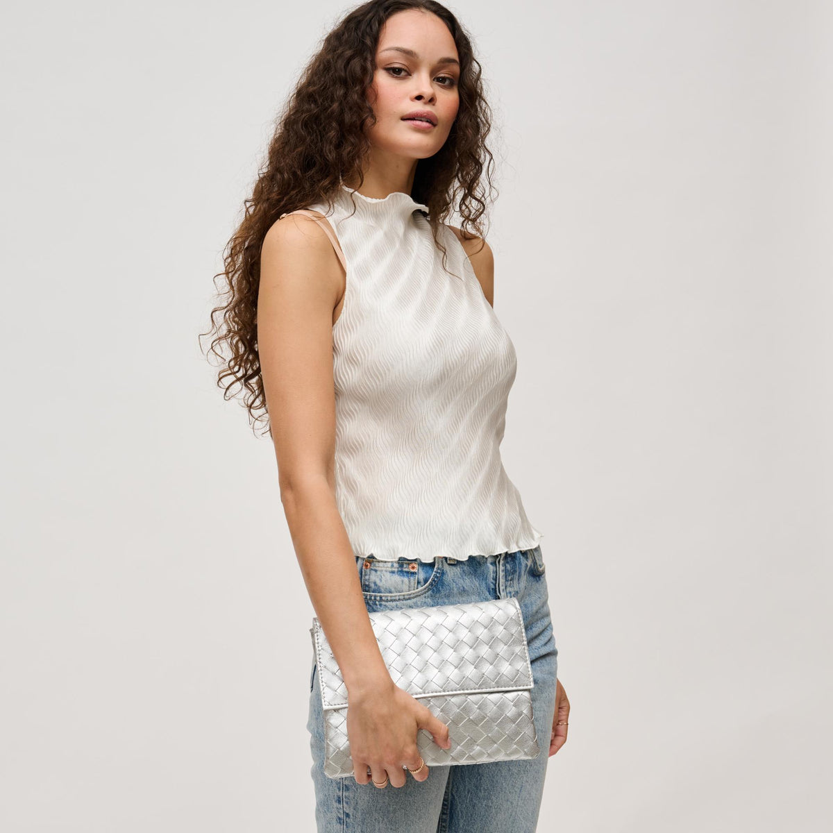 Woman wearing Silver Urban Expressions Ivy Clutch 840611133342 View 2 | Silver