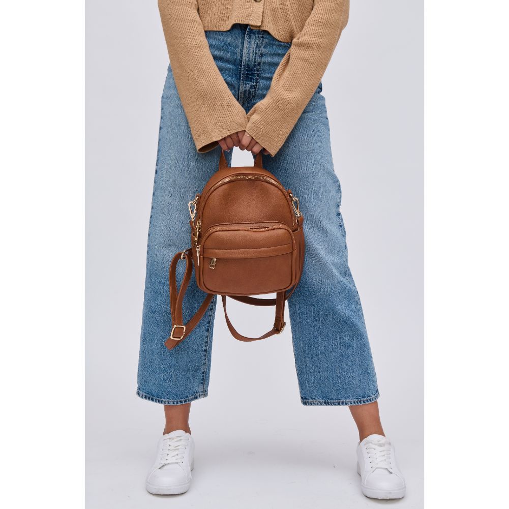 Woman wearing Tan Urban Expressions Uri Backpack 840611113603 View 3 | Tan