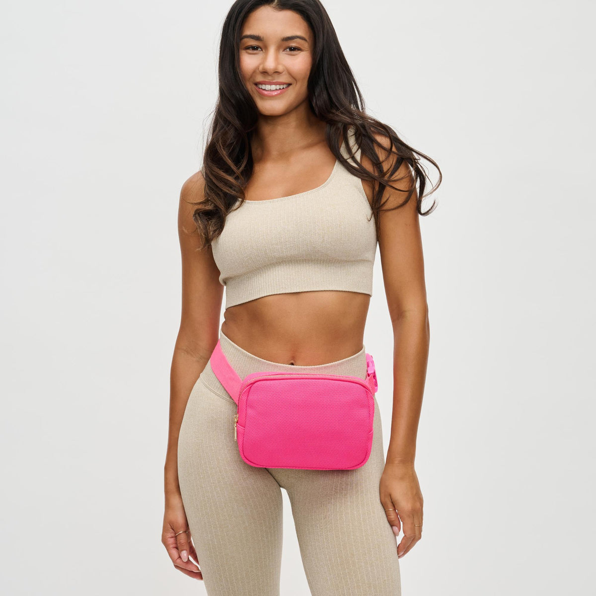 Woman wearing Hot Pink Urban Expressions Felix Belt Bag 840611122698 View 1 | Hot Pink