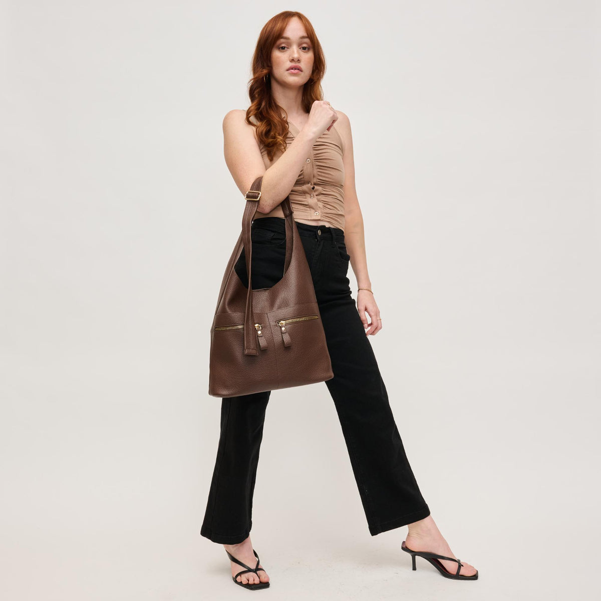 Woman wearing Chocolate Urban Expressions Rhea Hobo 840611145246 View 3 | Chocolate