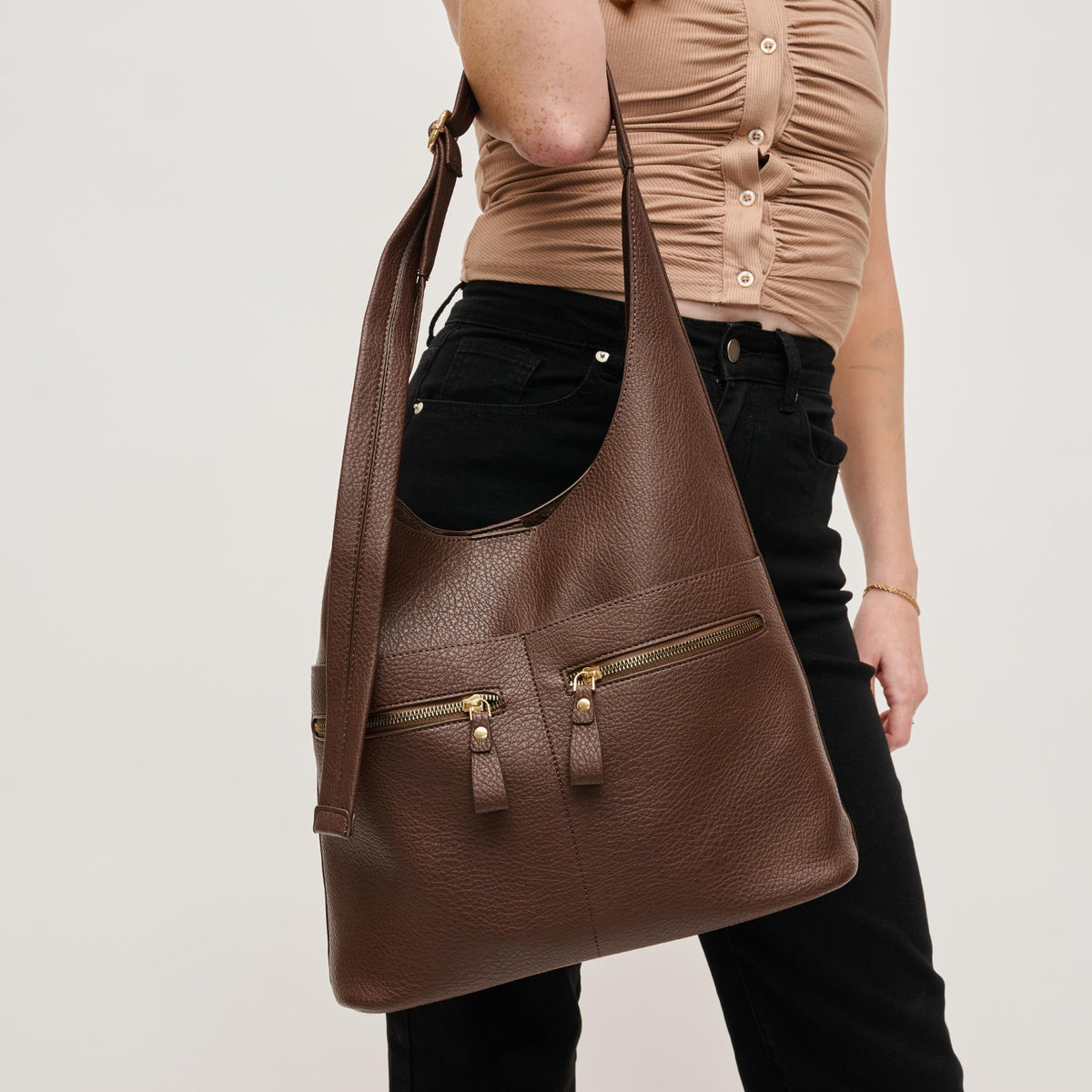 Woman wearing Chocolate Urban Expressions Rhea Hobo 840611145246 View 1 | Chocolate