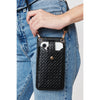 Woman wearing Black Urban Expressions Claire Woven Cell Phone Crossbody 840611102331 View 1 | Black